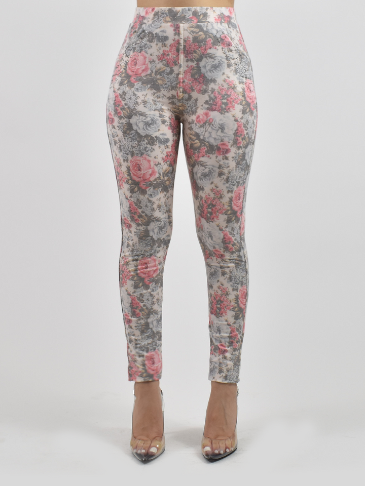 Close-up of pink floral jean texture showing realistic denim print and soft knit finish.
