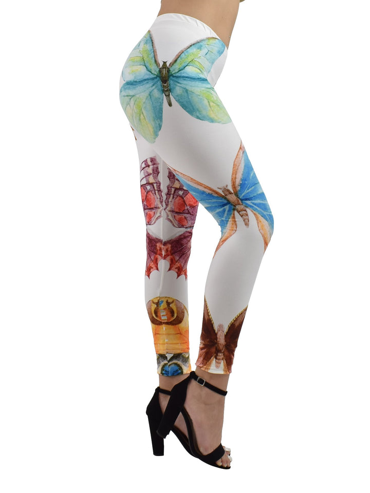 Close-up of Denimaxx butterfly print leggings with intricate multi-color design.