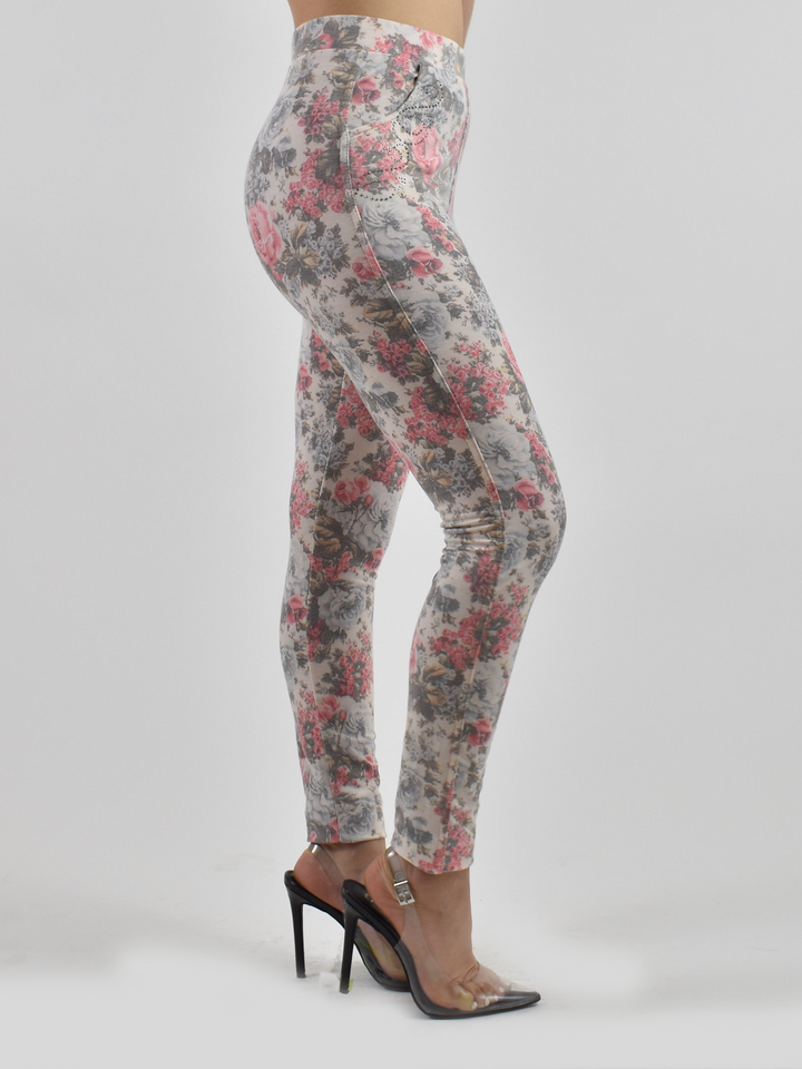 Close-up of pink floral jean texture showing realistic denim print and soft knit finish.