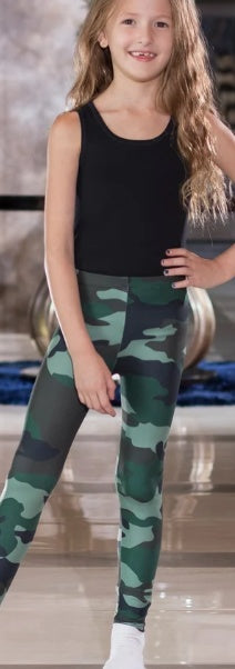 Girl wearing green camo print girls leggings