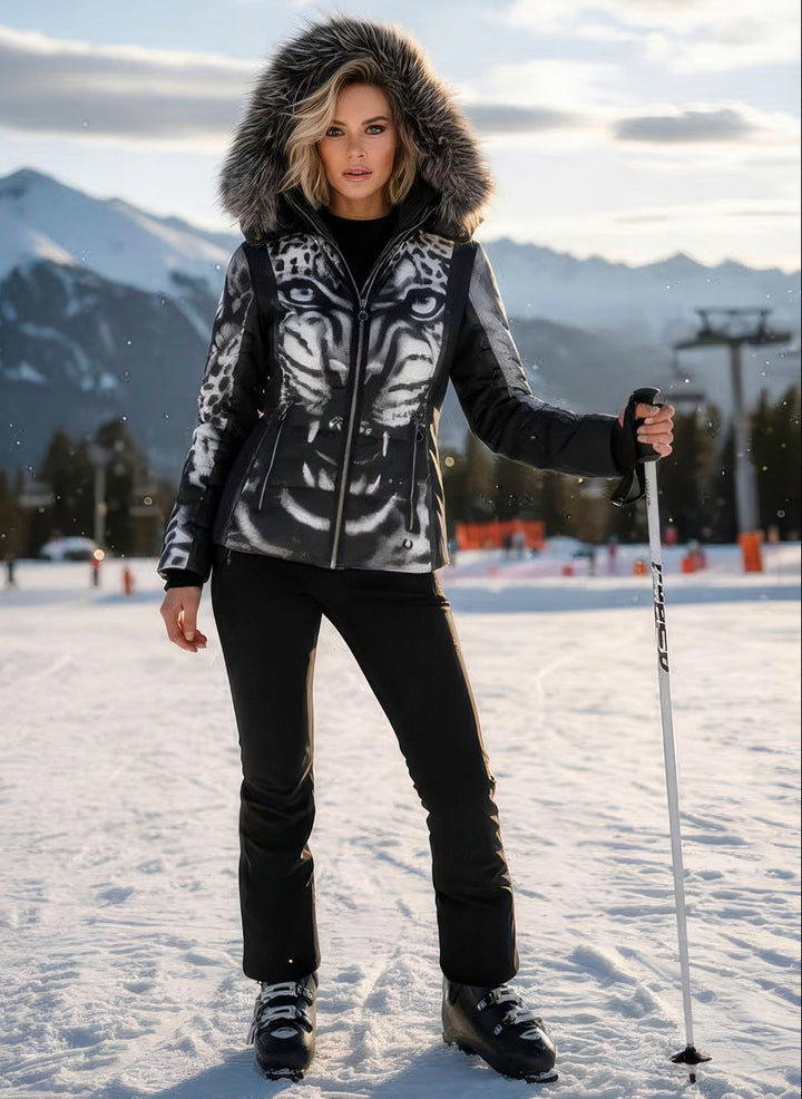 Sportalm women’s ski jacket with bold tiger-face print and fox-fur trim hood.

