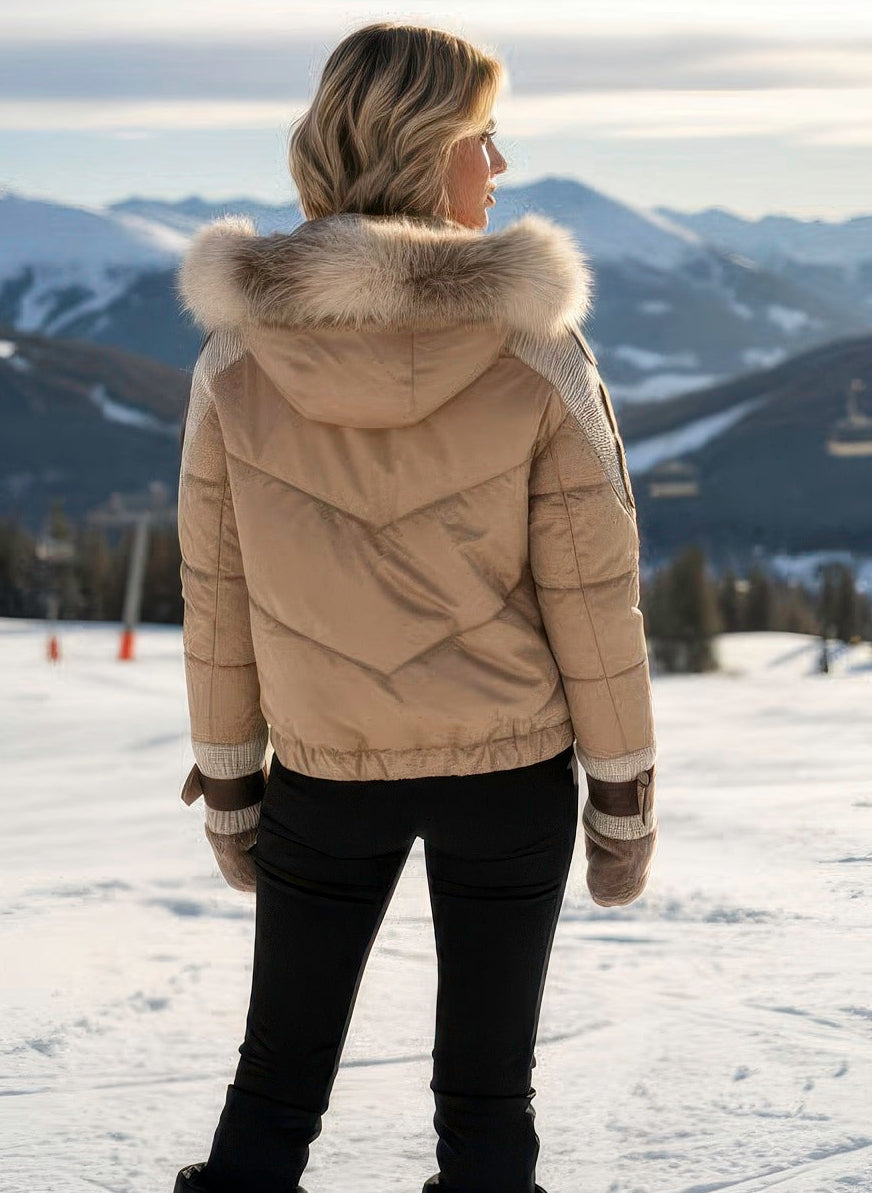 Denimaxx women’s shearling coat with fox-trim hood and mixed textures.

