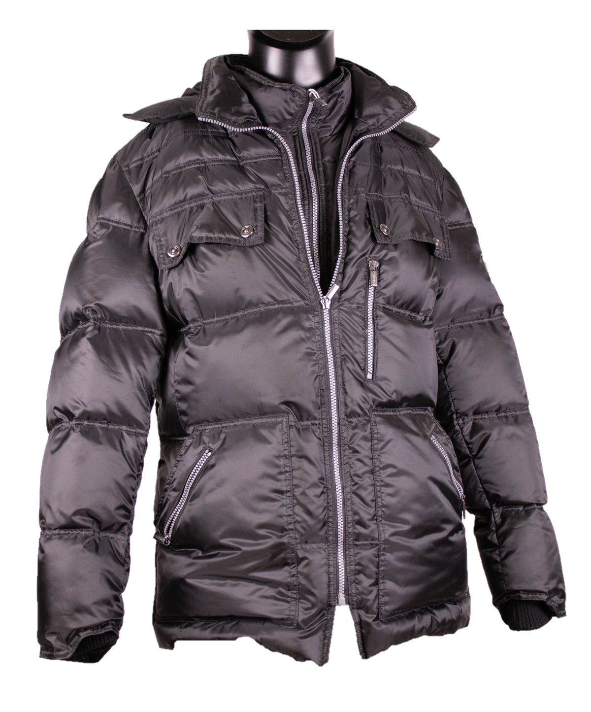 Front view of the zipped black satin goose down jacket with stand collar, flap chest pockets, and quilted satin finish.