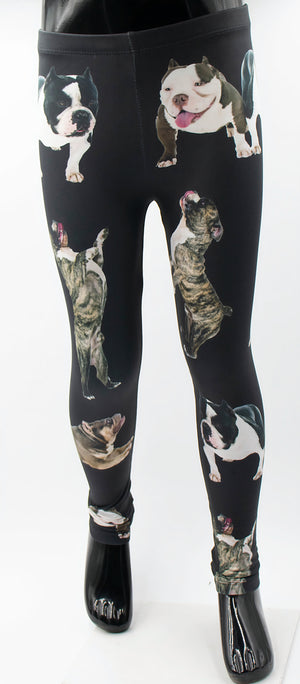 Kids Bully Breed print leggings with playful pit bull type dog photos on black fabric, shown on a mannequin.