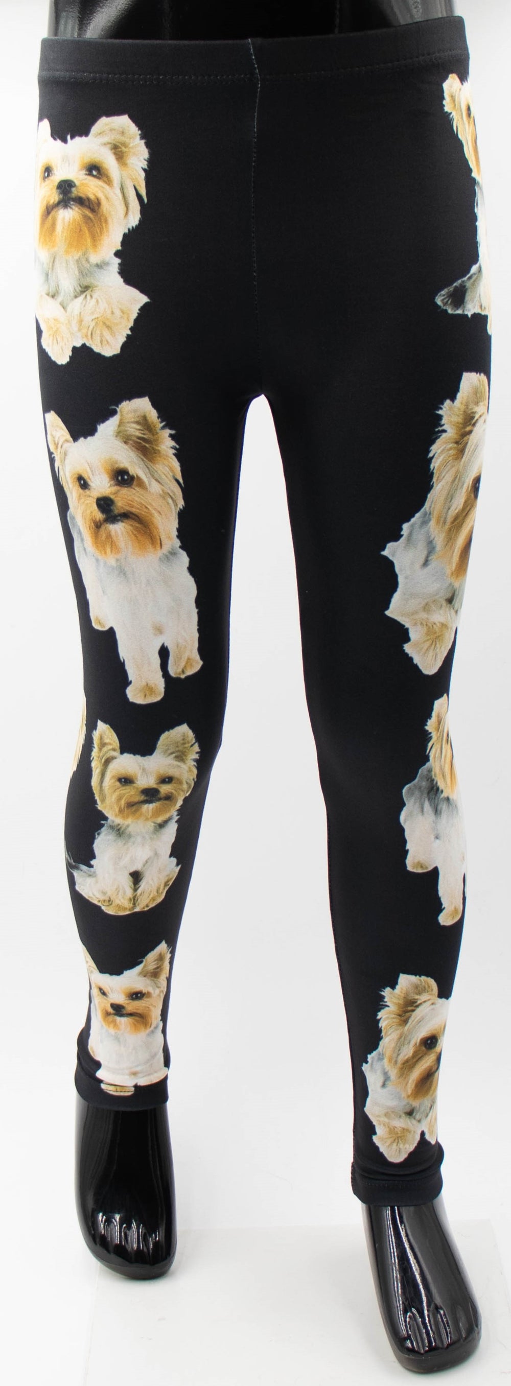 Denimaxx kids Yorkie Terrier print leggings with Yorkshire Terrier puppy photos on black fabric, shown on a mannequin.