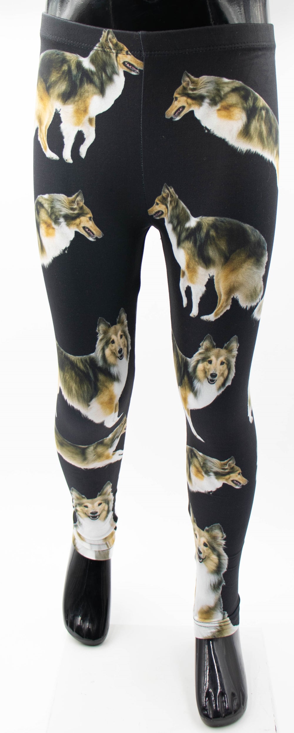 Denimaxx kids Sheltie print leggings with sable and white Shetland Sheepdog photos on black fabric, shown on a mannequin.