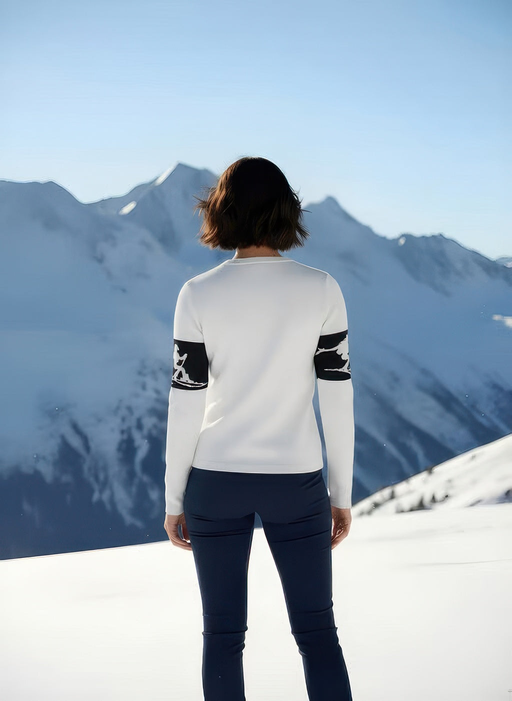 Back view of Denimaxx Women’s white, red, and black ski sweater showing ribbed cuffs, collar, and soft viscose knit texture