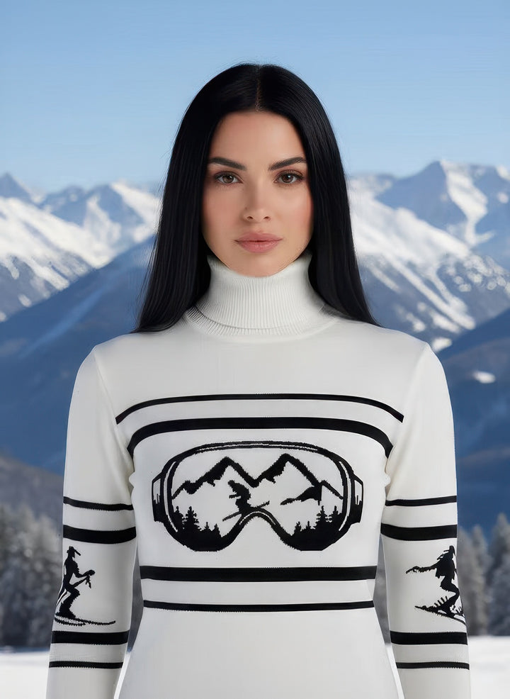 Denimaxx Women’s Visor Mountains Turtleneck Ski Sweater featuring bold alpine intarsia and cowgirl skiers on sleeves.
