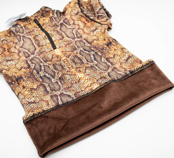 Close-up of Denimaxx Snake Print mid layer showing fine reptile pattern and glossy nylon surface.