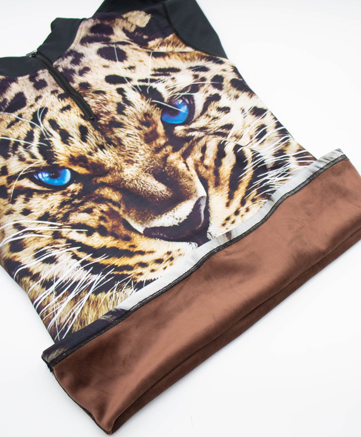 Close-up of Denimaxx Leopard Print mid layer showing soft velour inside and polished nylon outer layer