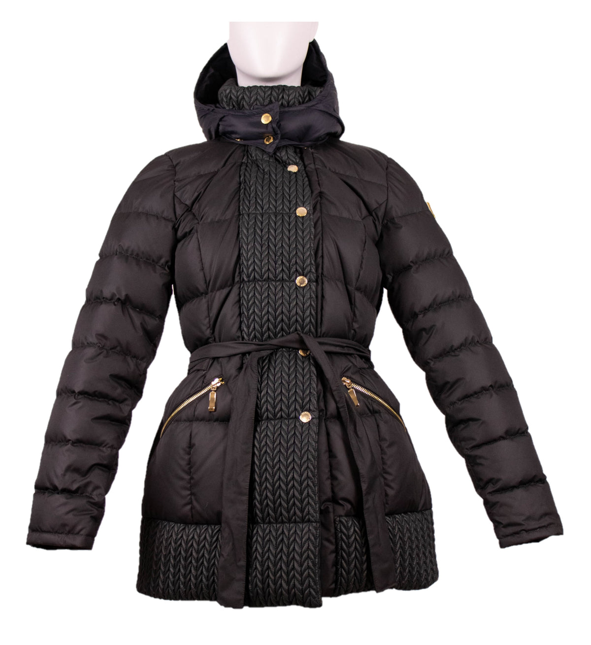 Black satin goose down puffer jacket with chevron knit panels, belted waist, and gold zipper hardware on white.