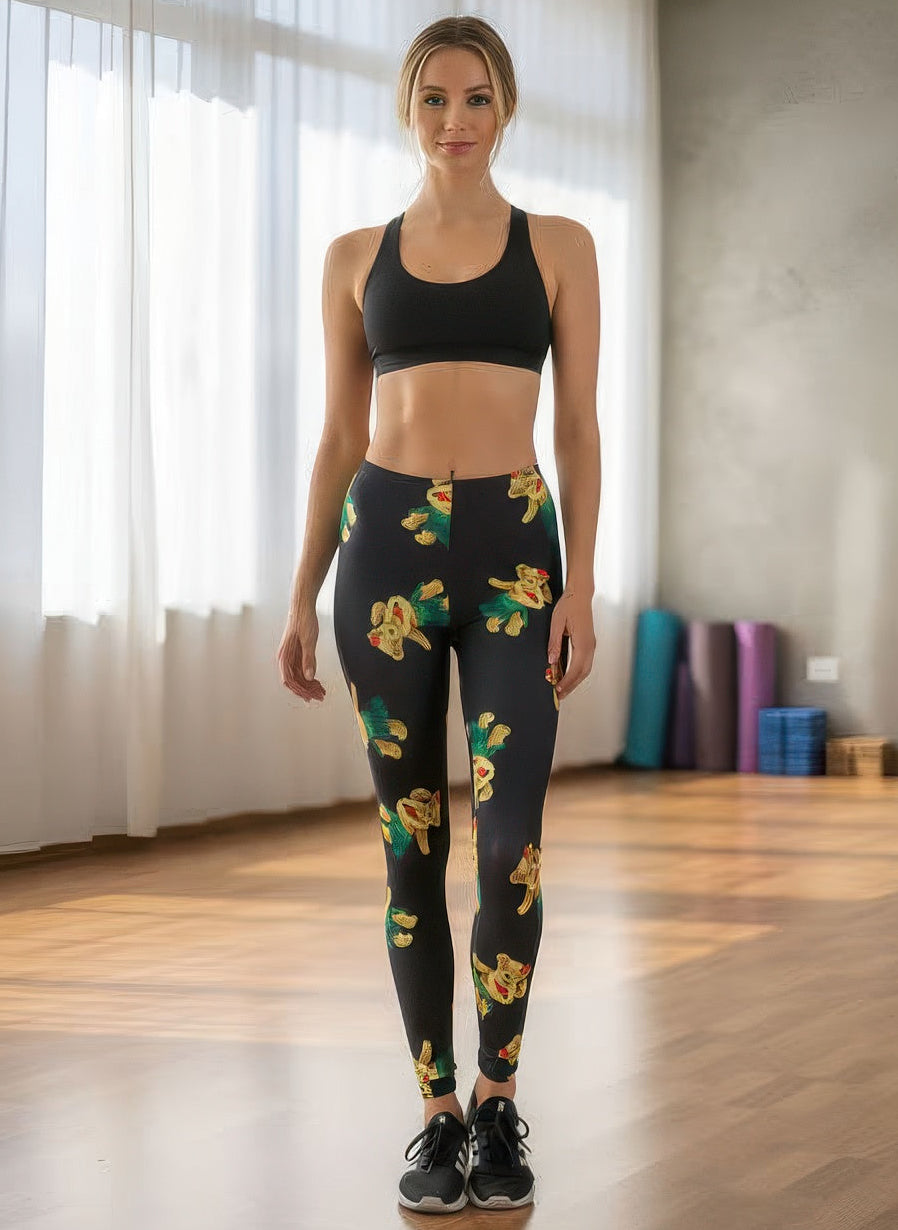 Close-up of Denimaxx Aloha Teddy Bear leggings showing detailed palm and hibiscus accents.