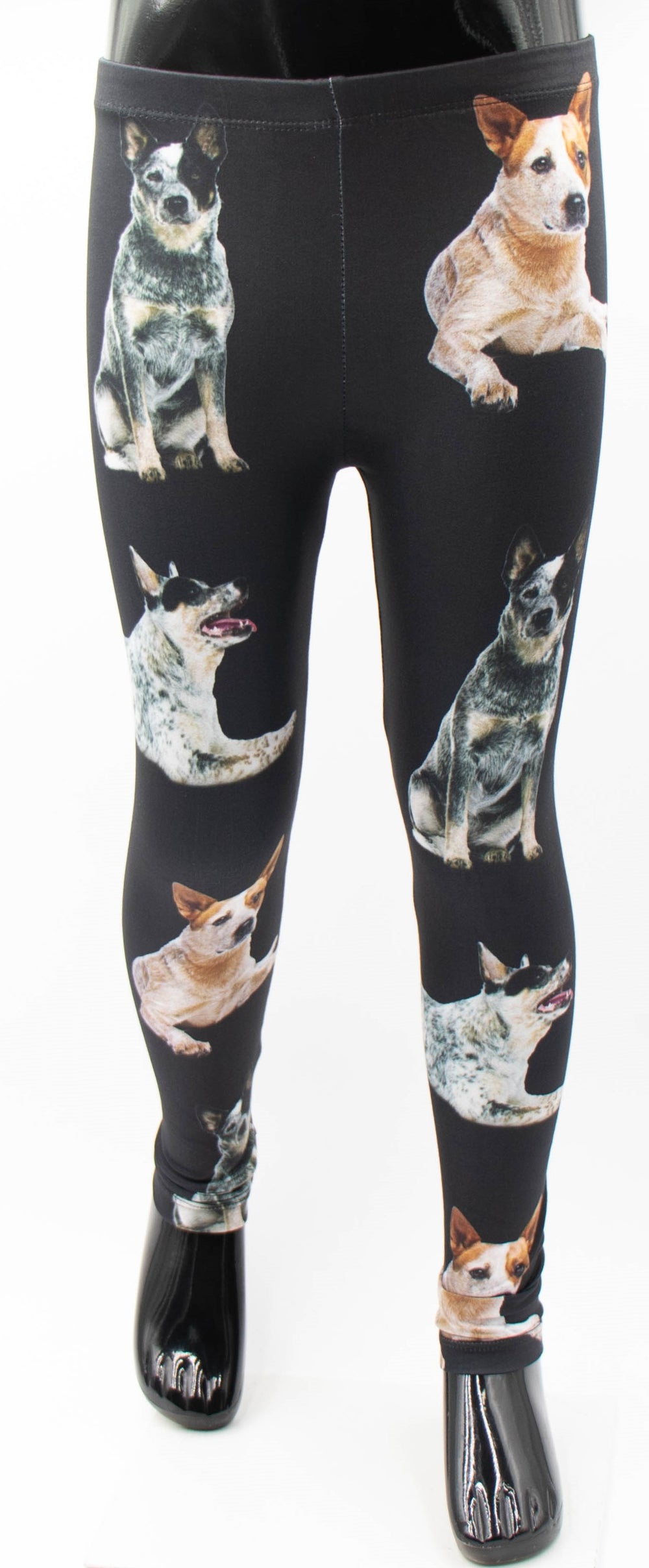 Denimaxx kids Australian Cattle Dog print leggings with blue and red heeler photos on black fabric, shown on a mannequin.