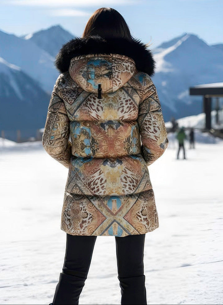 back view highlighting tailored silhouette and fox-trim hood detail.

