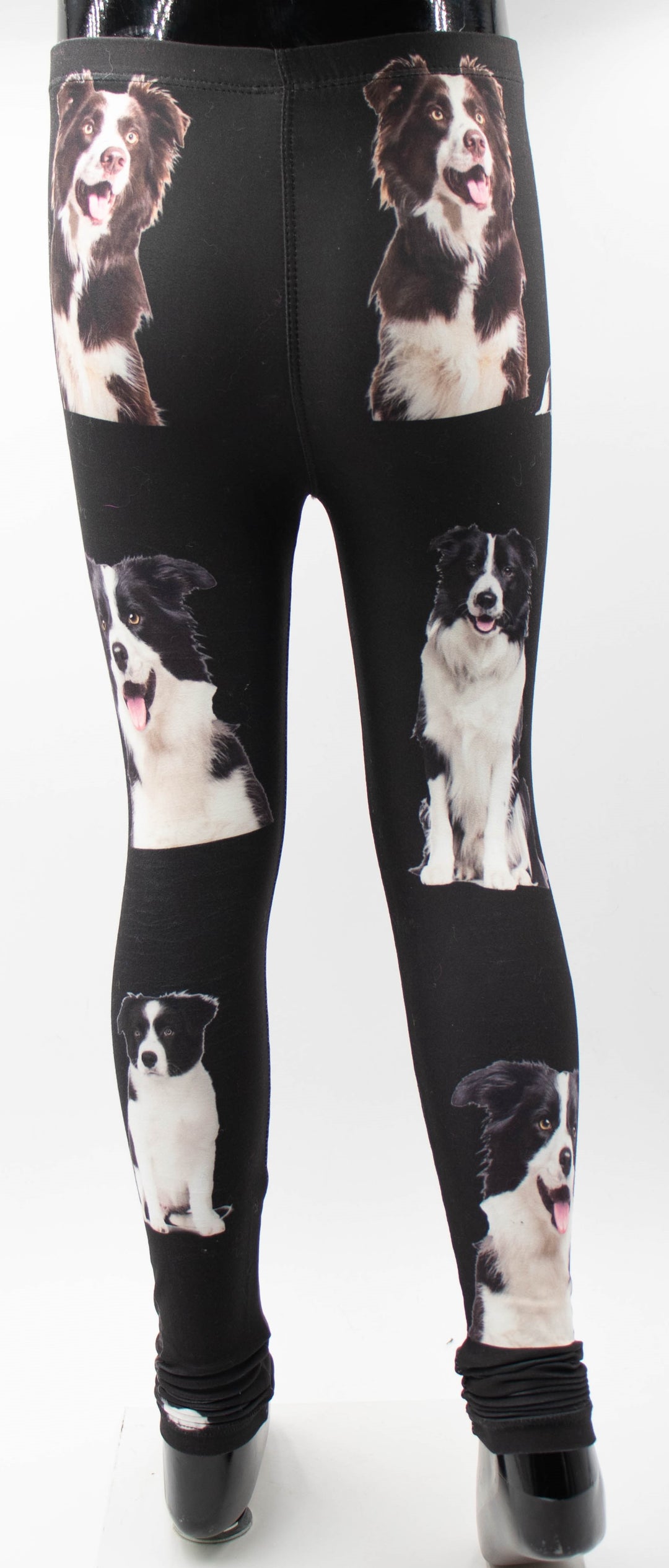 Back view of the Denimaxx kids Collie print leggings on a mannequin, showing black and white border collie graphics on black fabric.