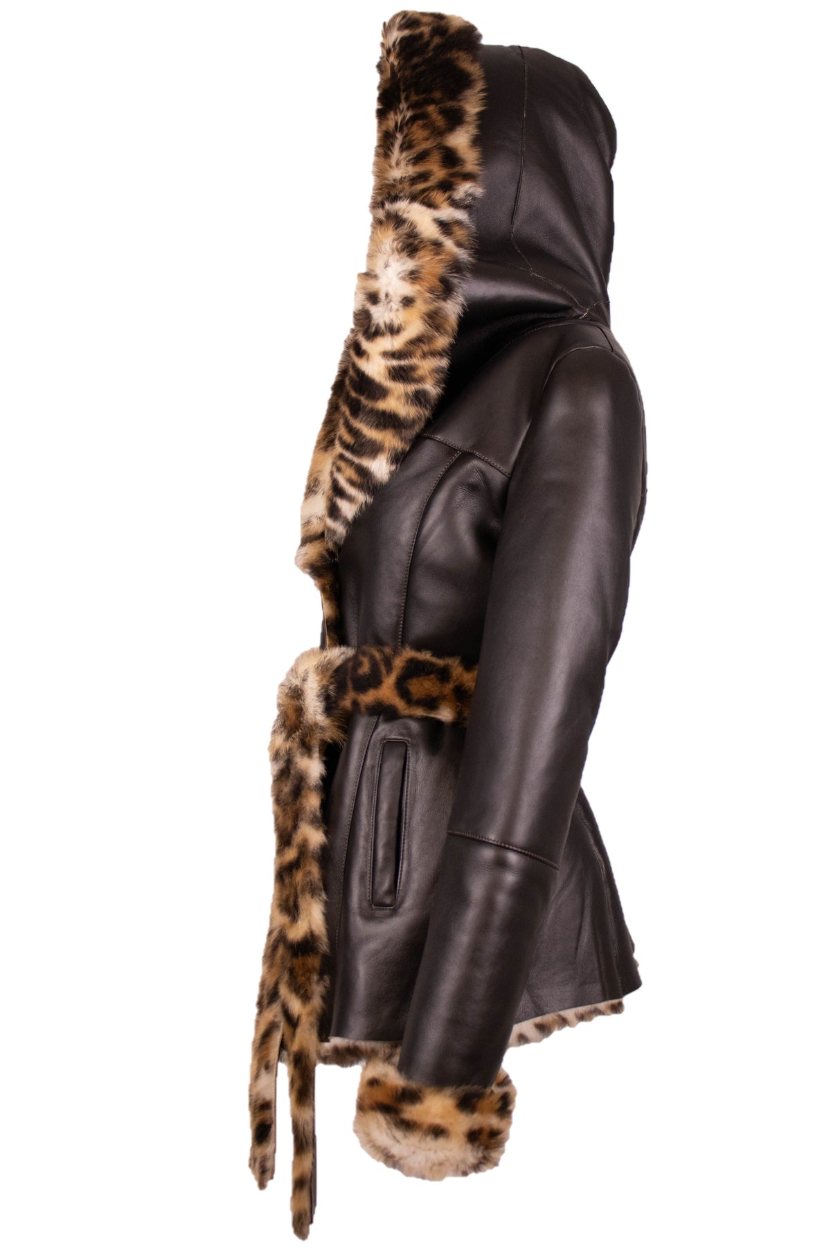 Side view of the animal print Toscana shearling coat in dark brown leather with leopard print cuffs and belt, mannequin display.