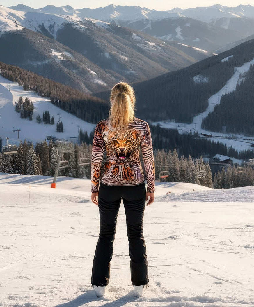 Denimaxx Women’s Cheetah half-zip mid layer in stretch nylon velour with smooth nylon outer finish.

