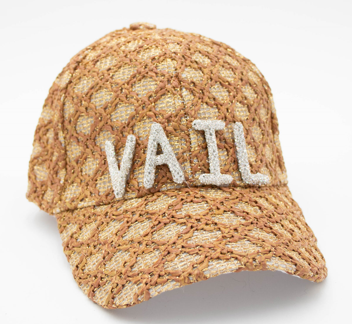 Front view of the Vail baseball cap with sparkling crystal VAIL letters on brown and gold woven fabric, white background.