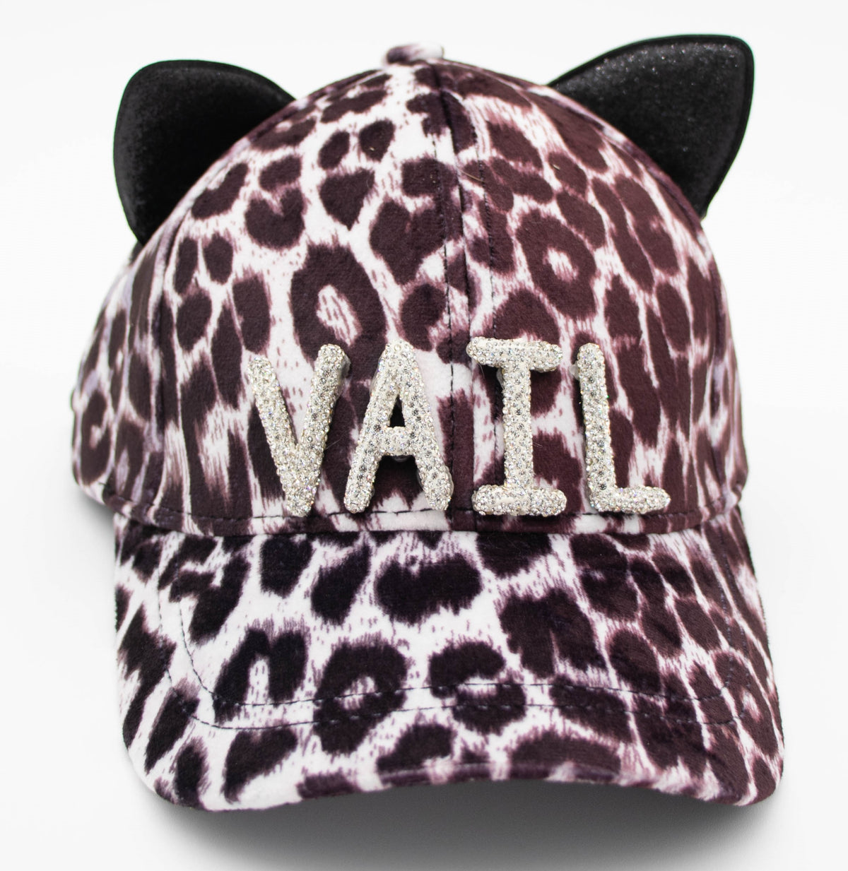 Crystal Vail cat ear baseball cap with leopard print, black cat ears, and sparkling crystal VAIL lettering across the front.