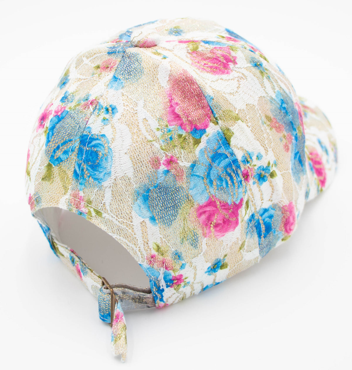 Back view of the Crystal Vail floral cap showing the pink and blue flower pattern and adjustable back strap.