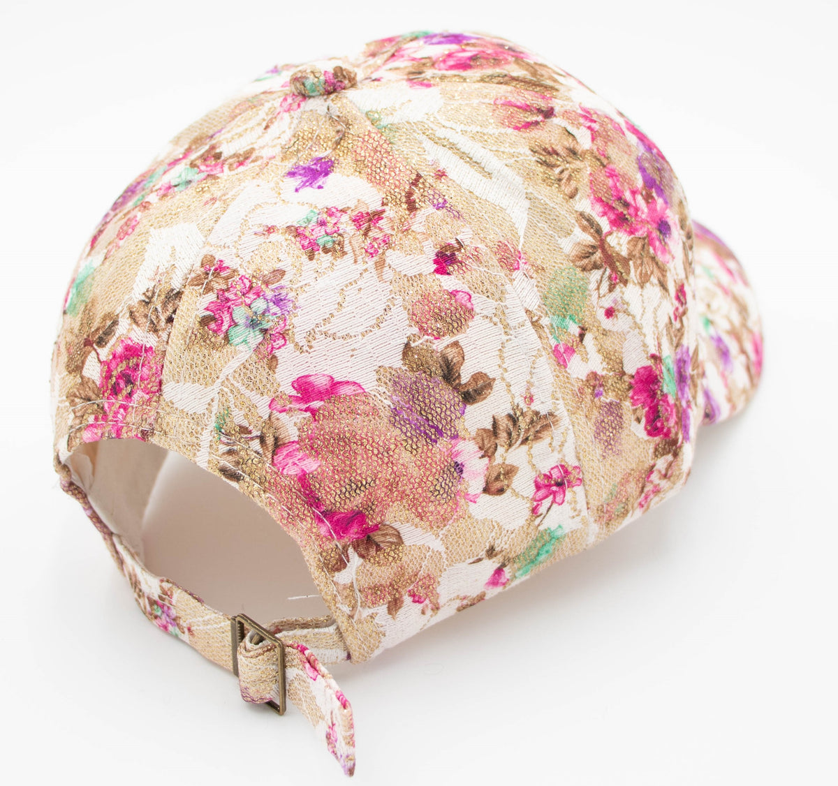 Back view of the Crystal Vail floral baseball cap showing the pink and purple flower print and adjustable buckle strap.
