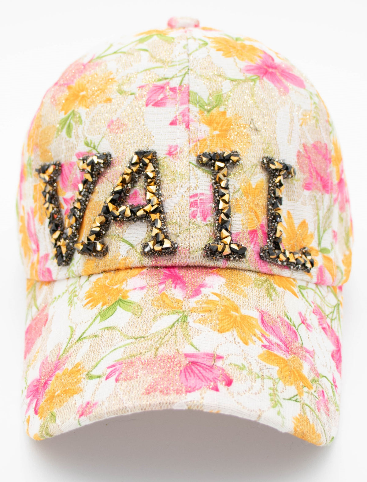 Crystal-Embellished Vail baseball cap with black and gold crystal VAIL letters over pink and orange floral lace, front view.
