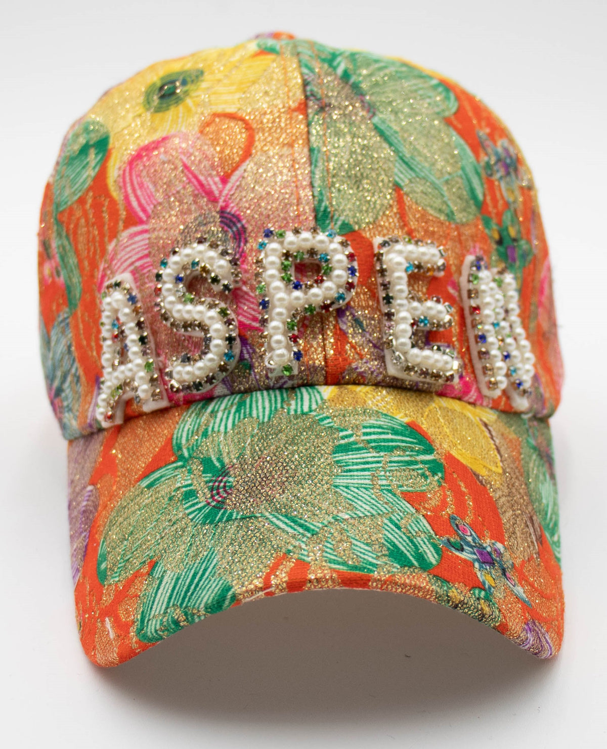 Pearl Aspen embellished baseball cap with orange tropical floral print and pearl-beaded ASPEN lettering, front view.