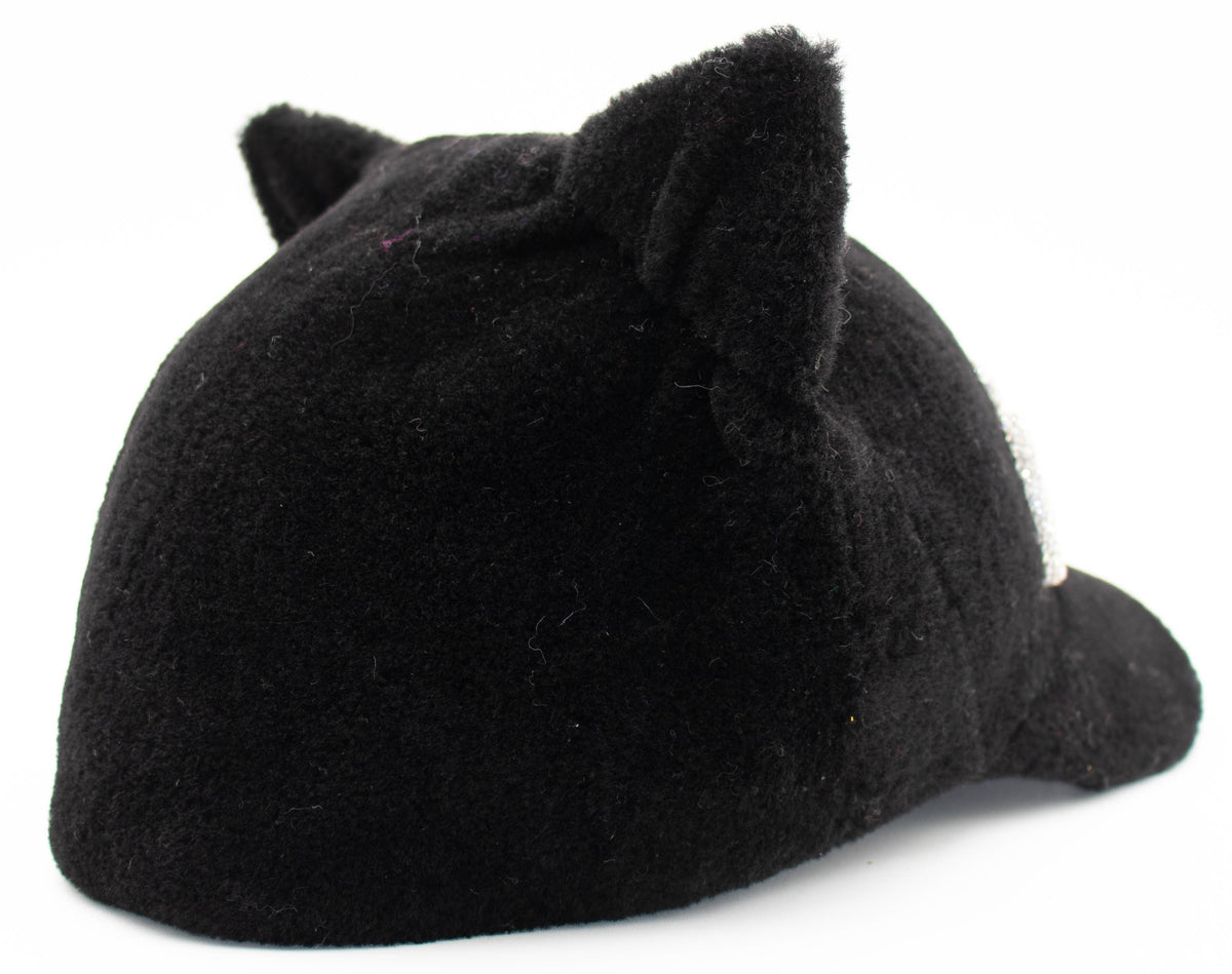 Back view of the black Apres cat ear hat showing the knit cat ears, flat product shot on white.