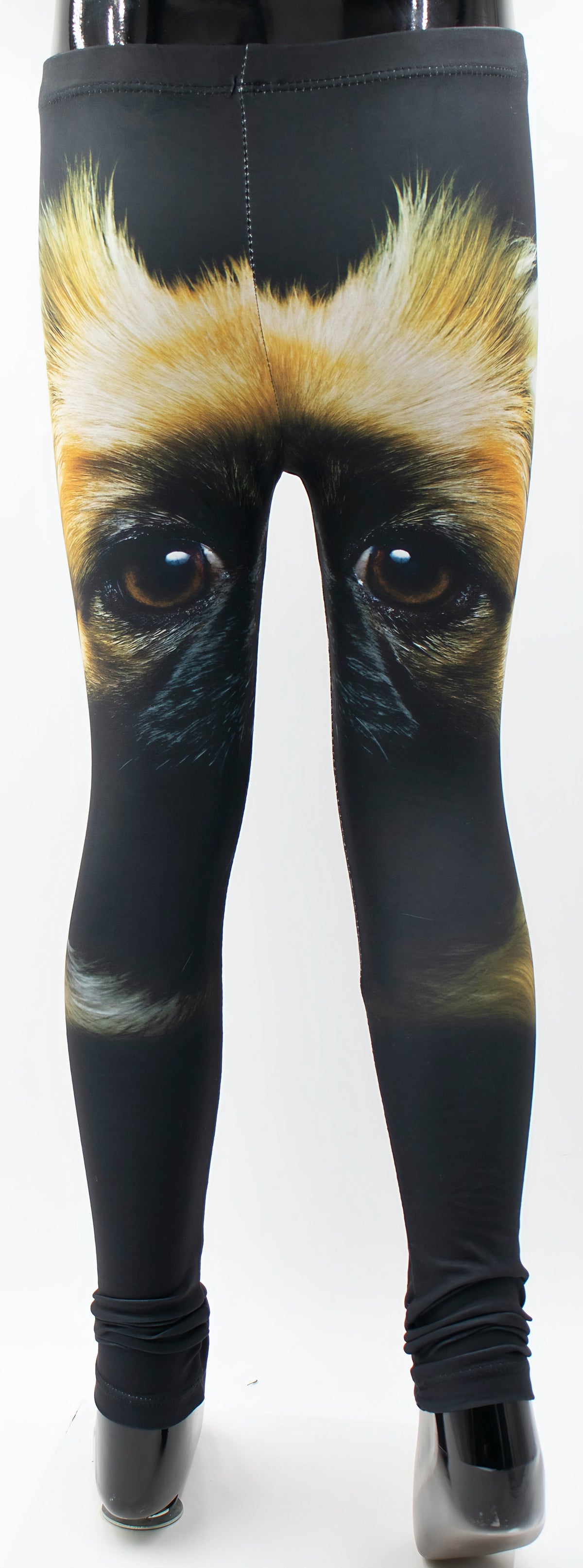 Back view of the kids Pekingese print leggings showing the realistic dog face artwork wrapping around the legs, mannequin display.