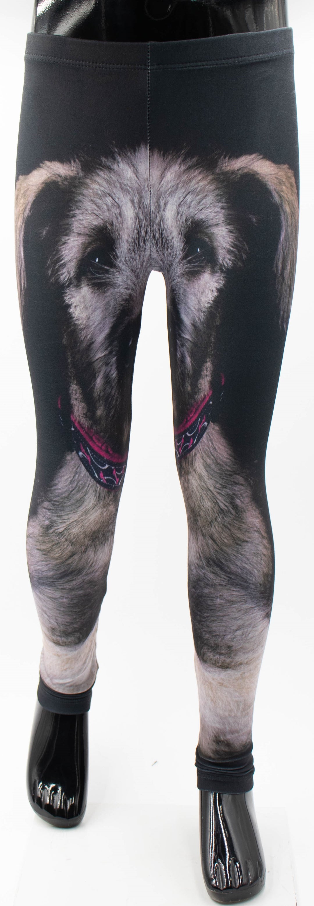Front view of Denimaxx kids Irish Wolfhound print leggings on a mannequin, wolfhound face print with pink collar detail on black fabric, white studio background.