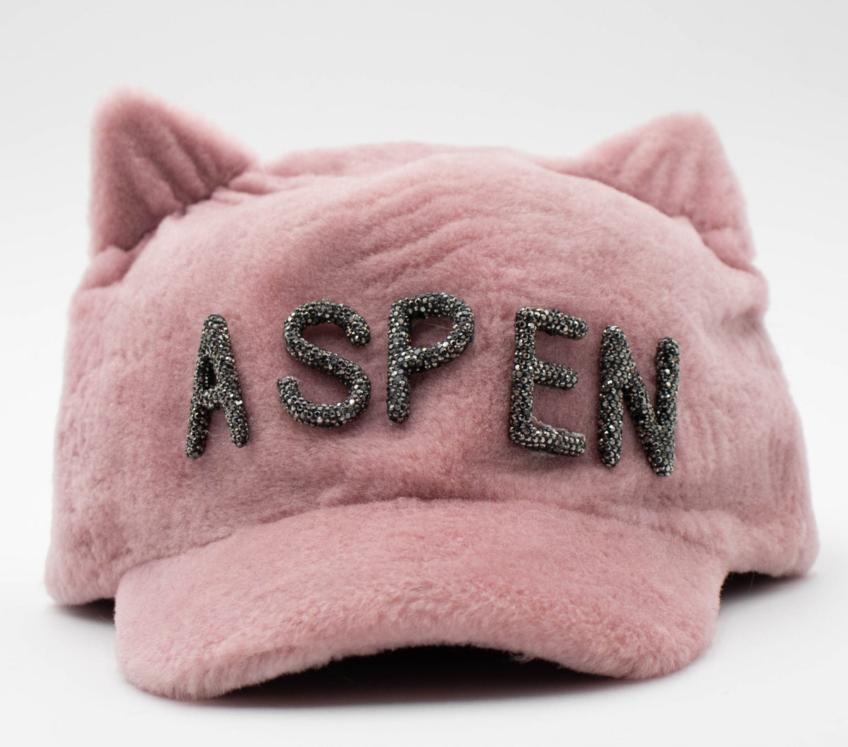 Pink Aspen Crystal cat ear winter hat with beaded ASPEN lettering, shown on a white background.
