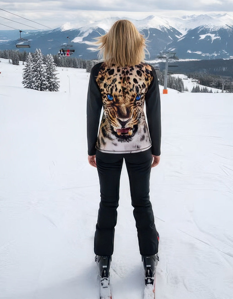 Super soft Denimaxx Leopard Print ski mid layer featuring plush velour interior and sleek nylon exterior.