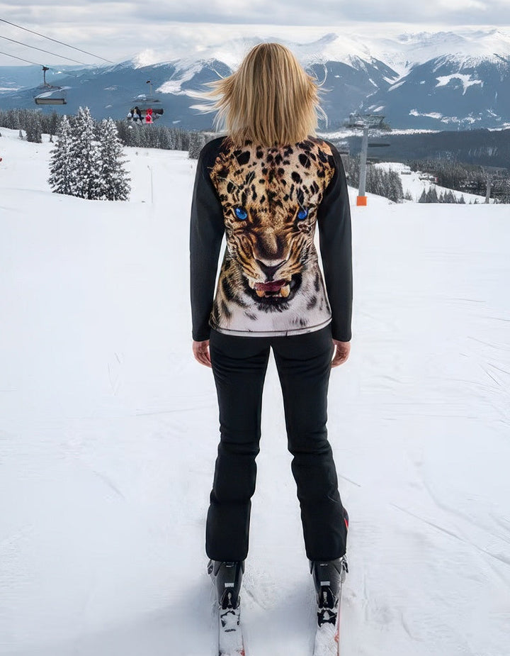 Super soft Denimaxx Leopard Print ski mid layer featuring plush velour interior and sleek nylon exterior.
