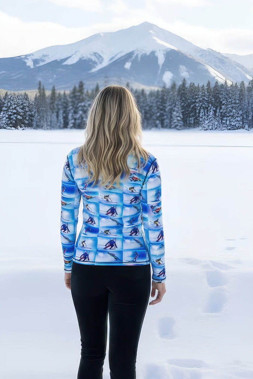 Denimaxx Women’s Skier mid layer top featuring vintage skier print and half zip design.


