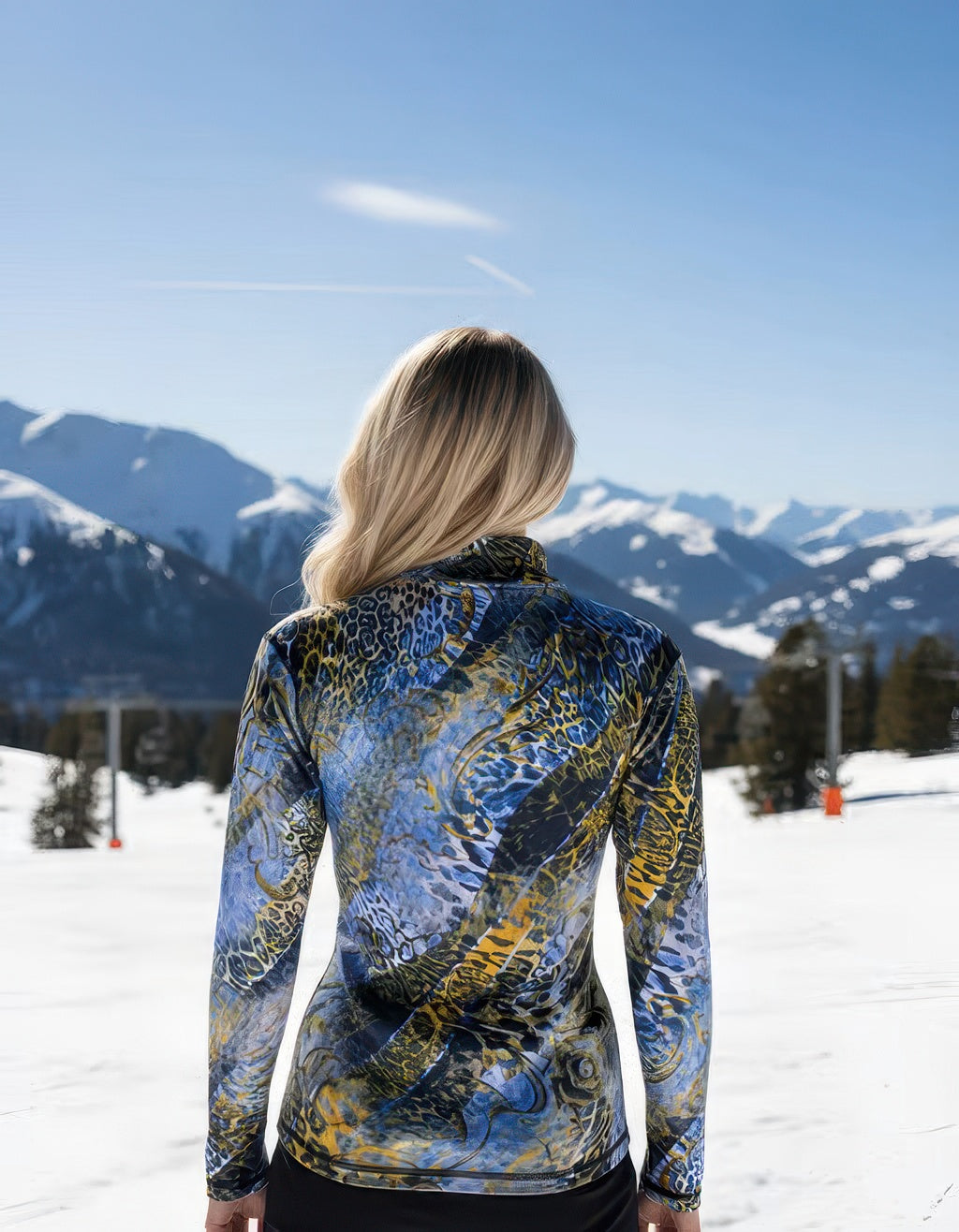 Snake pattern Denimaxx mid layer top featuring smooth nylon exterior and soft velour interior.

