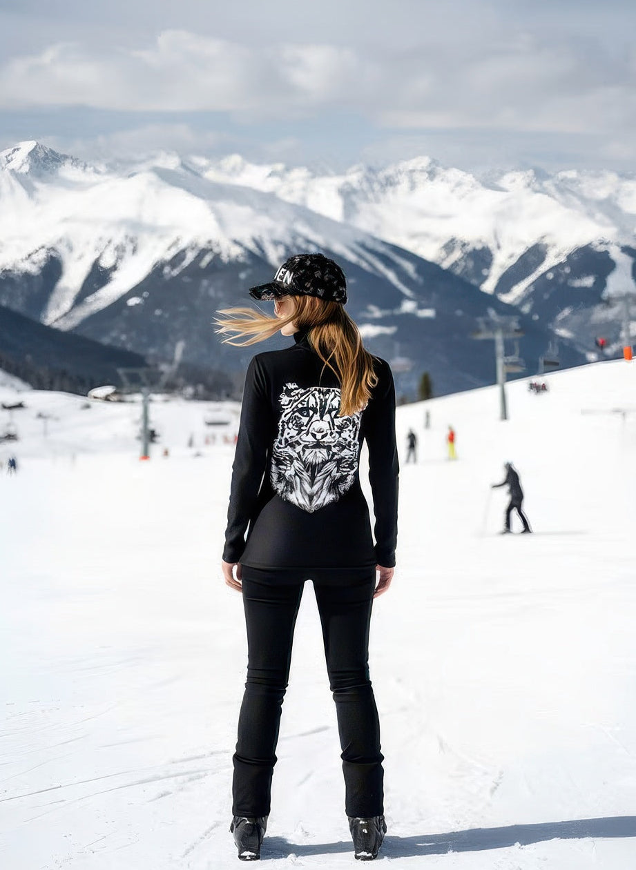Snow Leopard print Denimaxx mid layer featuring soft velour interior and smooth nylon exterior.

