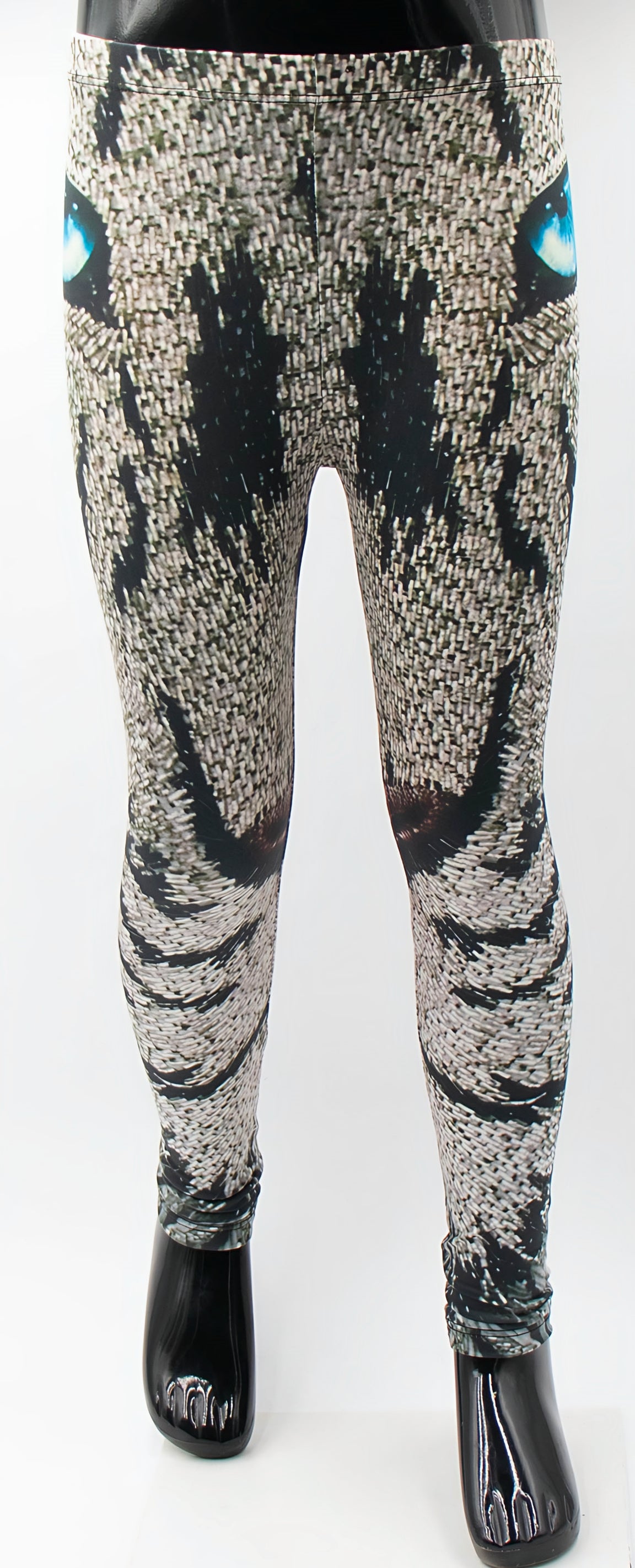 Kids roaring lion print leggings with a mosaic lion face and blue eyes, shown on a mannequin.