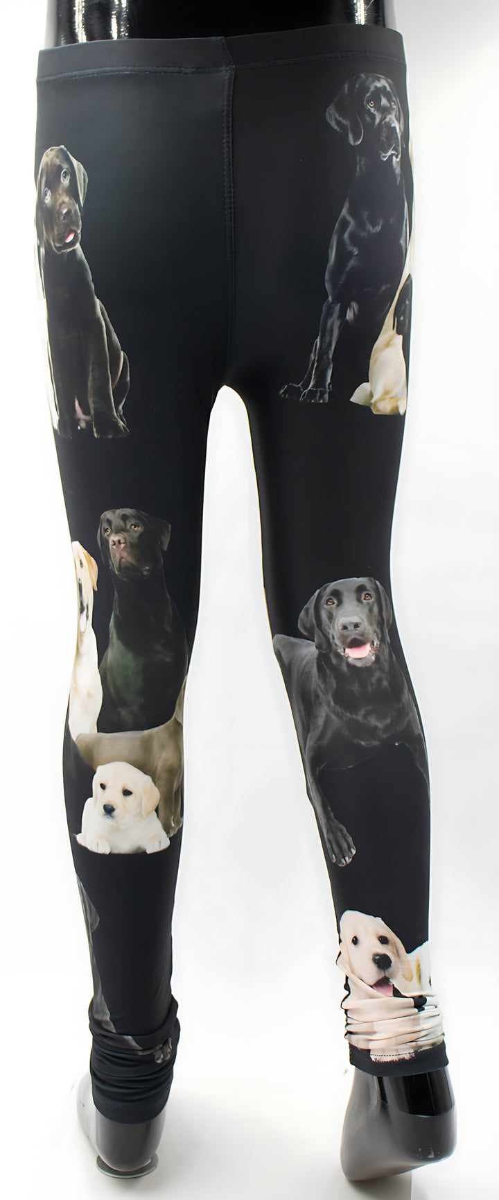 Kids Labrador print leggings on a mannequin, displaying black and yellow Labrador dogs across the black fabric.