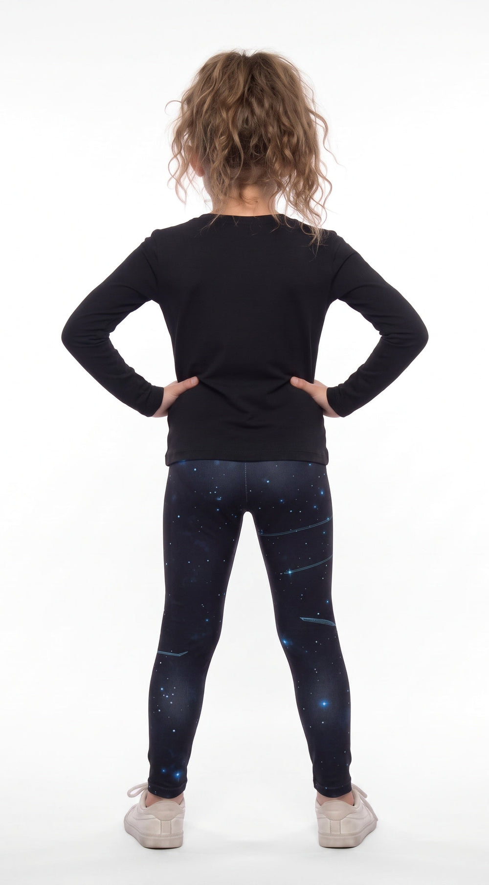 Constellations print girls leggings, navy starry night with stars and streaks, back view
