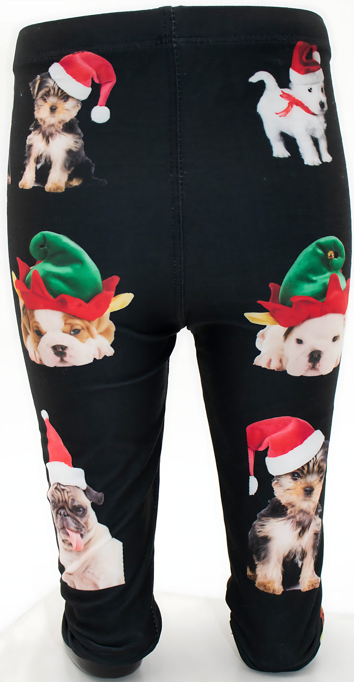 Back view of kids Christmas dogs print leggings with dogs in Santa and elf hats on black, mannequin display.