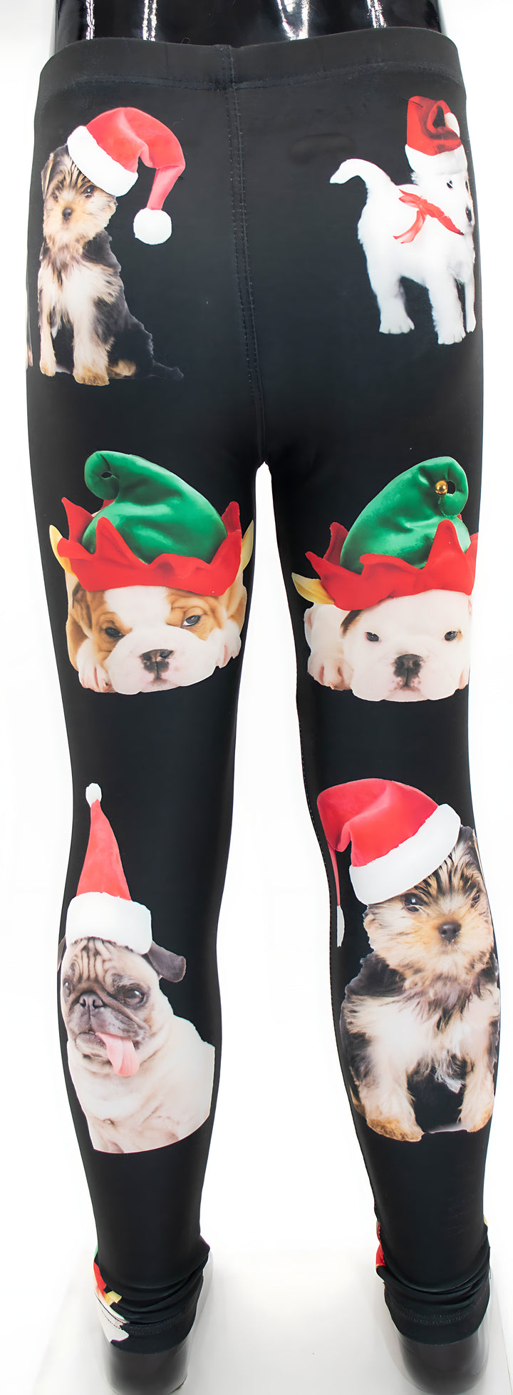 Back view close-up of kids Christmas dogs print leggings with Yorkies, Bulldogs, and a Pug in holiday hats.
