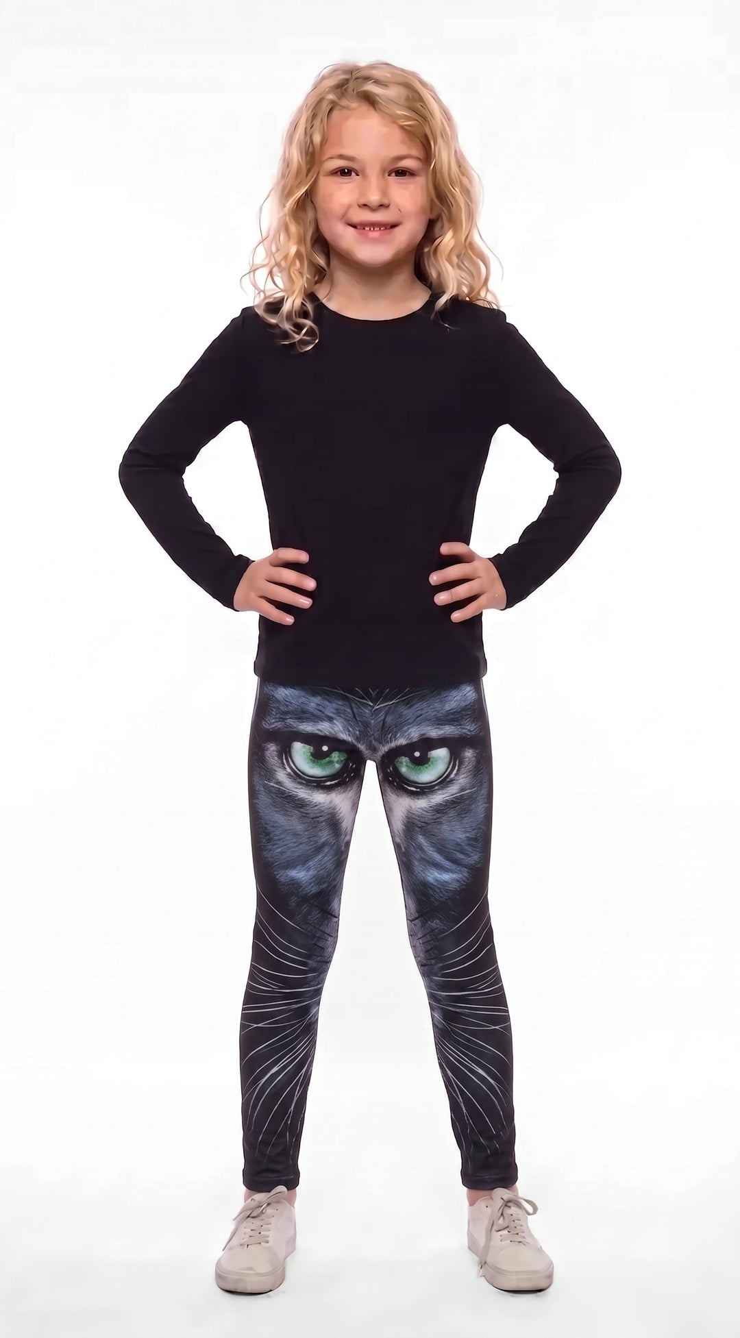 Black cat face print girls leggings with green eyes and white whiskers, front view