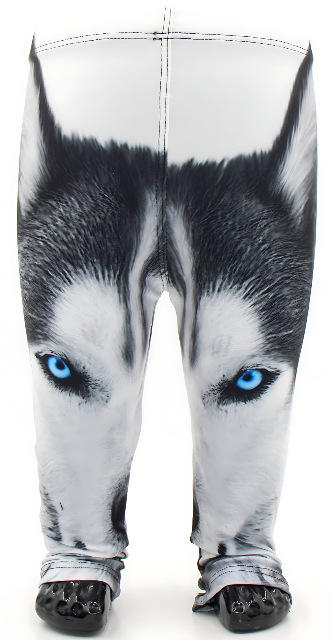 Front view of kids Wolf print leggings with a blue-eyed wolf face on white, shown on a child mannequin with black shoes.