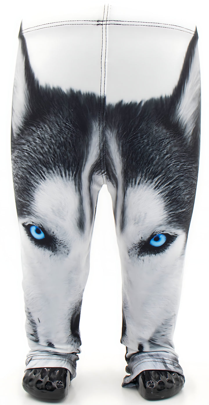 Front view of kids Wolf print leggings with a blue-eyed wolf face on white, shown on a child mannequin with black shoes.