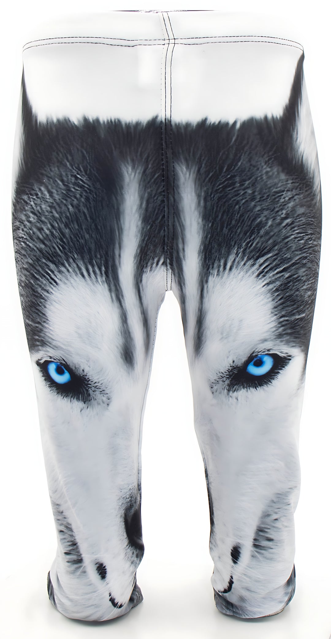 Close-up front view of kids Wolf print leggings showing the blue-eyed wolf face print and white waistband.