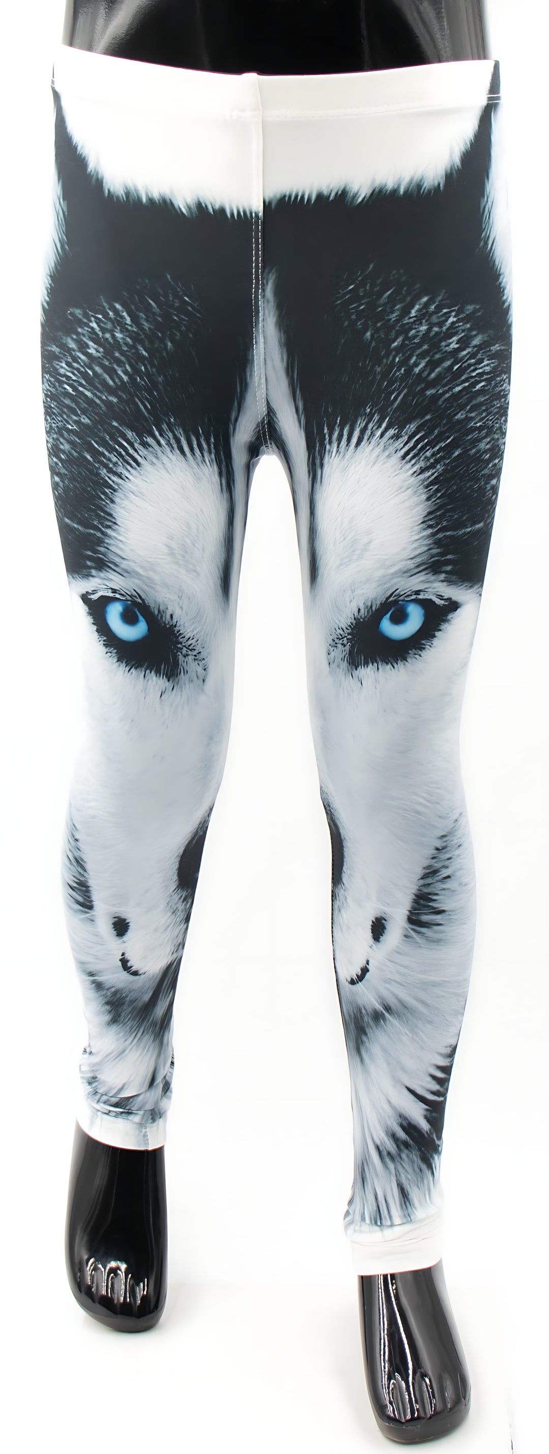 Full-length front view of kids Wolf print leggings with the blue-eyed wolf face design on a black child mannequin.