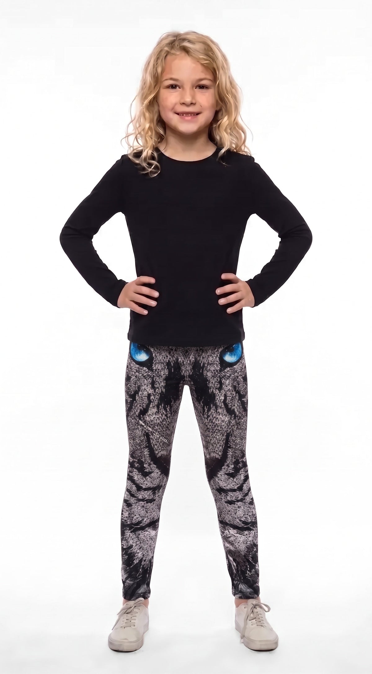Roaring lion print girls leggings, gray mosaic lion face with blue eyes at the waistband, front view