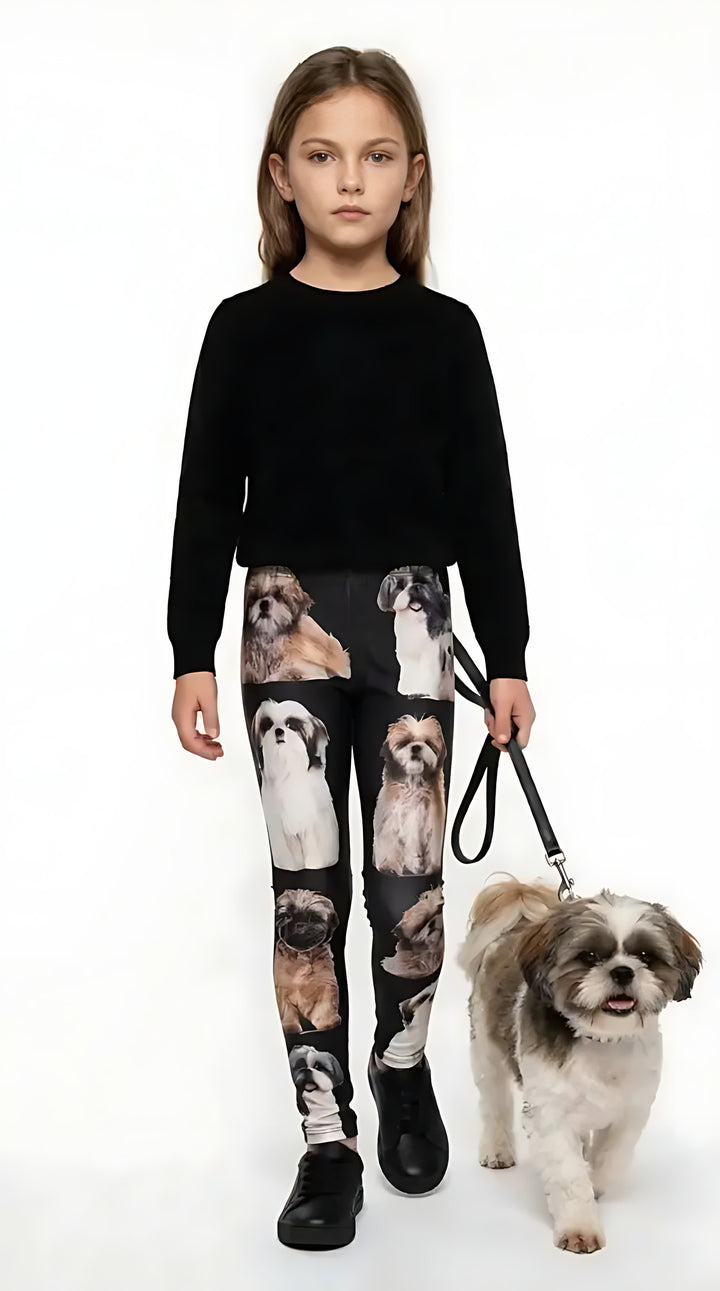 Girl wearing black Shih Tzu print kids leggings with a Shih Tzu dog