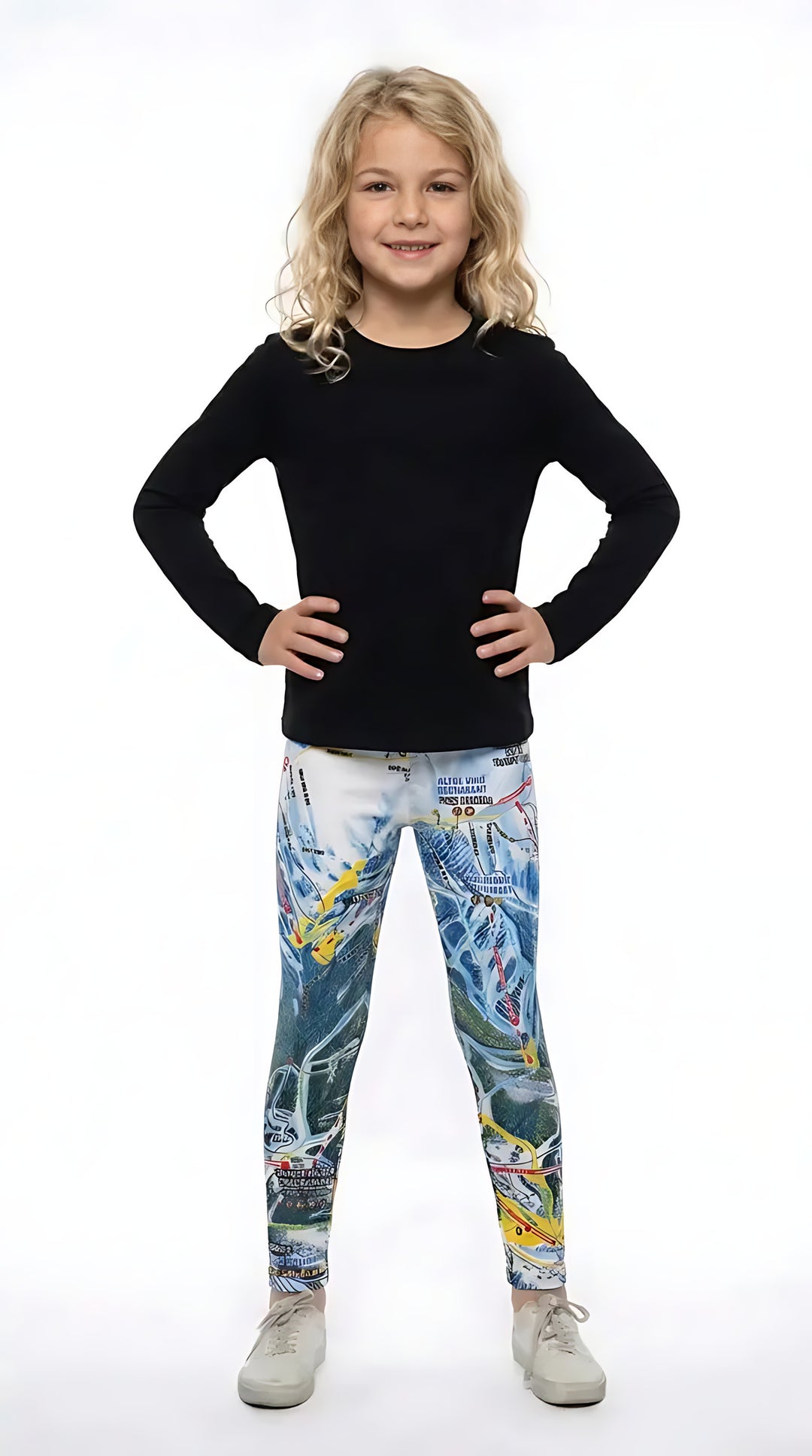 Girl in a black long-sleeve top and sneakers wearing Telluride ski trail map print girls leggings