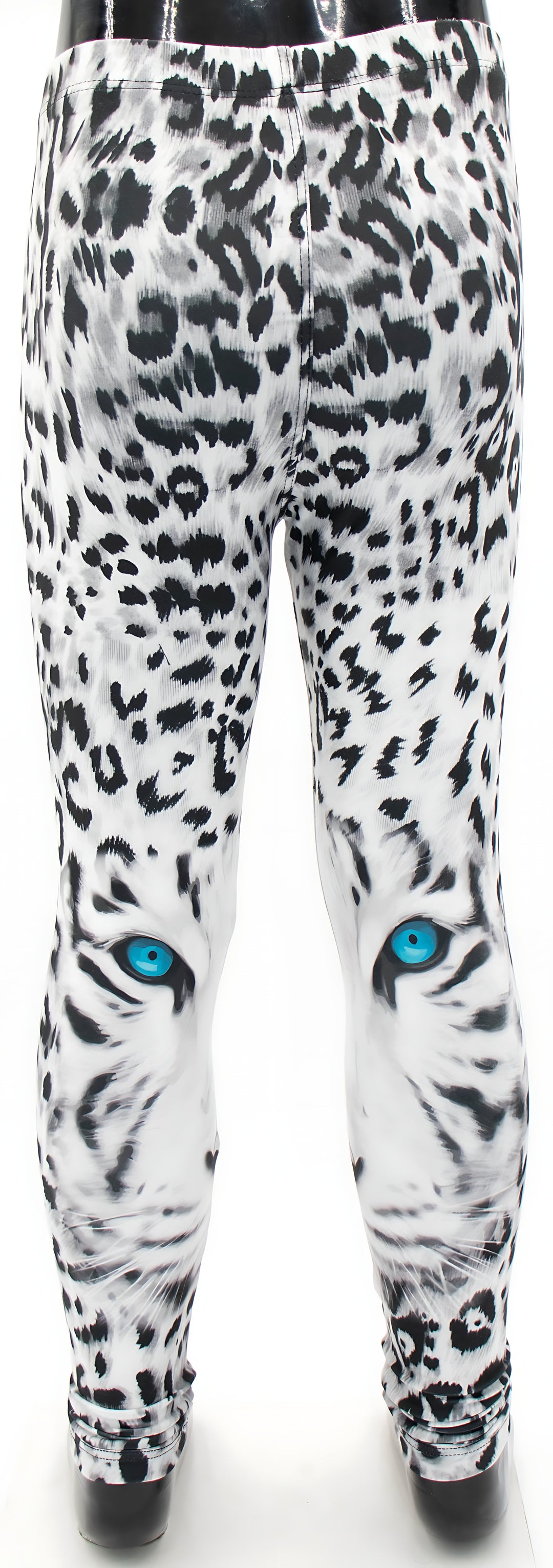 Kids snow leopard print leggings on a mannequin, symmetrical spotted pattern with blue eyes, front studio shot.